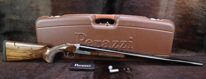 GunBroker Item #1053541539, No. 100 Engraved Perazzi DC12 SC3 12 GA 30" IM/M Double Barrel SxS Shotgun was sold for $22,524.00 on 7/07/2024