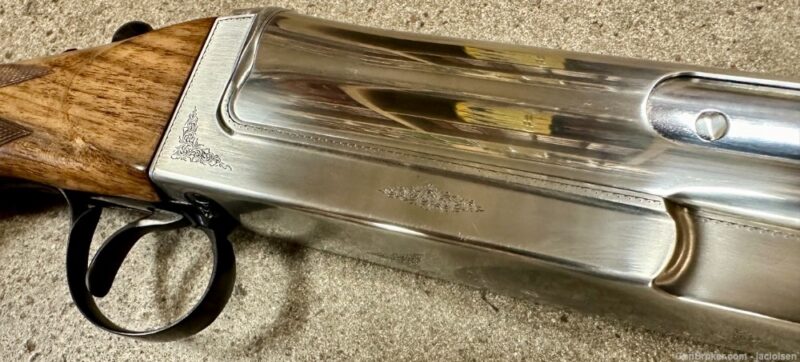 GunBroker Item  #1059497009, NIGHTHAWK COSMI STEEL 20 GAUGE SEMI AUTO 28" Hand Engraved 20GA was sold for $28,999.00 on 8/27/2024