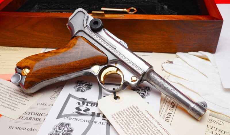 GunBroker Item ##1062259232, GRAIL Luger Iron Cross "Deluxe" 9mm *FACTORY HAND ENGRAVED W/GOLD INLAY* was sold for $25,025.00 on 8/25/2024